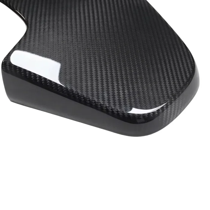 Close-Up Texture Of Bmw F9X G8X Carbon Fibre Seat Back Panel - Gloss Finish Detail