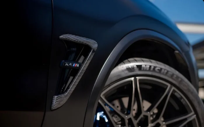 Installed Bmw X4M Carbon Fibre Side Vent With M Emblem On Vehicle, Showing Oem Fitment And Aerodynamic Upgrade
