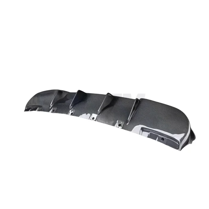 Top-down detail shot of the carbon fibre rear diffuser for Alfa Romeo Giulia, highlighting aerodynamic contours and fin layout