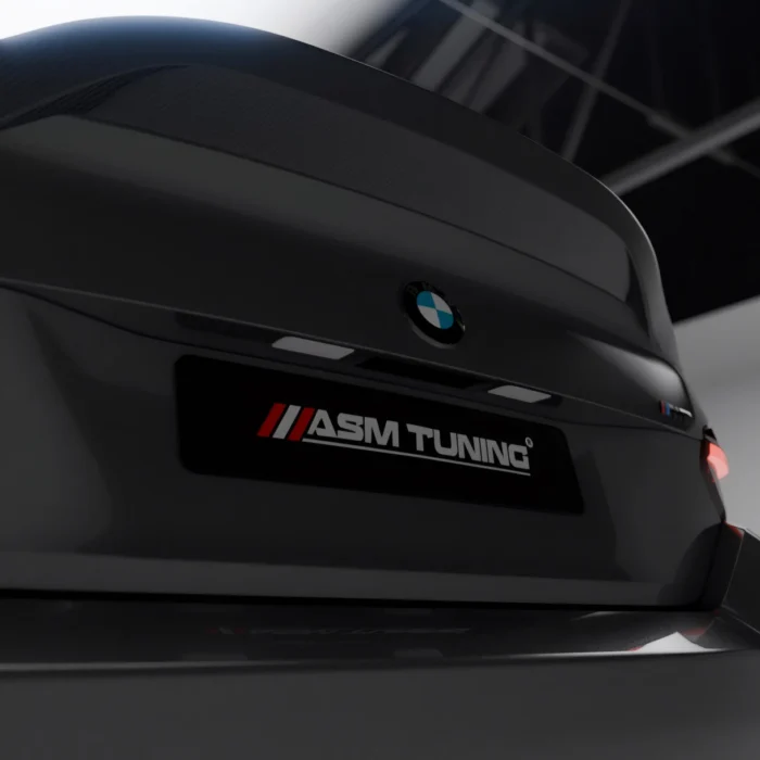 Angled view of BMW G87 M2 carbon fibre spoiler integrated with rear boot lid for sporty OEM+ fitment