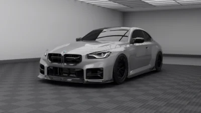 Front three-quarter view of BMW G87 M2 finished in Nardo grey, featuring full dry carbon fibre aero kit with aggressive front splitter