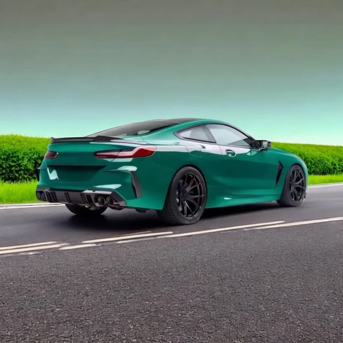 BMW M8 F91/F92/F93 full carbon fibre body kit – rear view driving shot showing spoiler, diffuser and side skirts