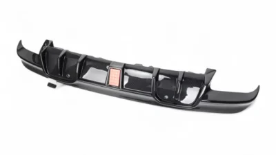 Side profile view of BMW X5M F95 rear carbon diffuser – showcases installation depth and fin detail