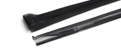 Underside detail of BMW X5M F95 carbon rocker extensions – gloss carbon finish with accurate fitment alignment
