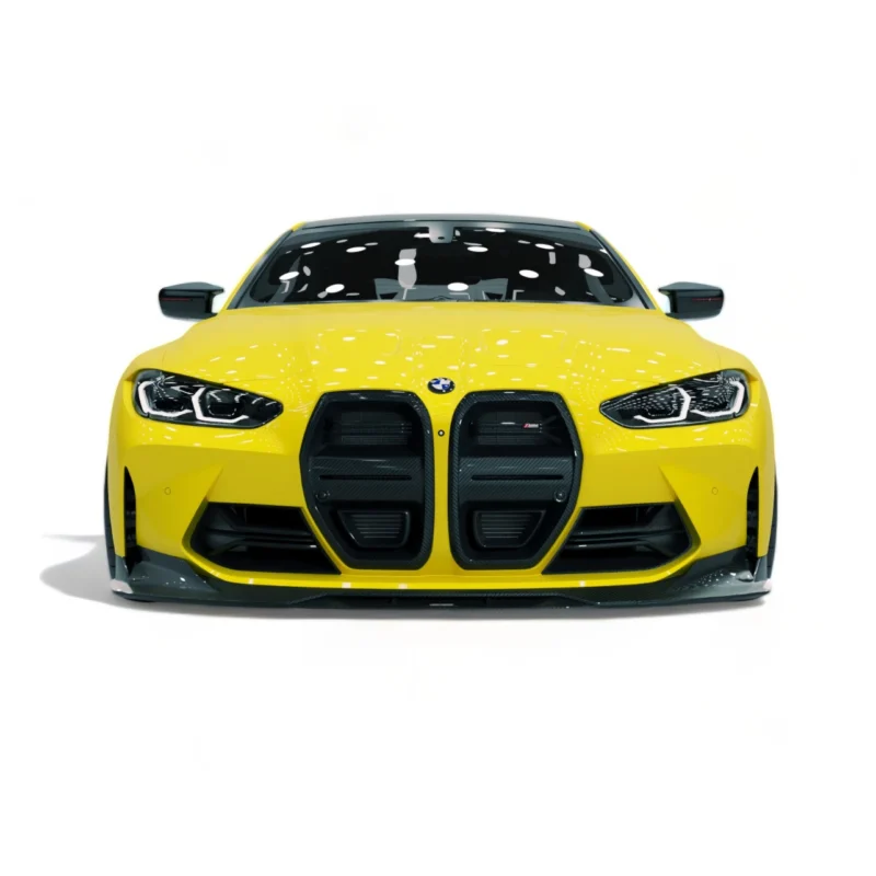Front view of yellow BMW M4 G82/G83 fitted with ASM carbon fibre bumper ducts and air intake grilles