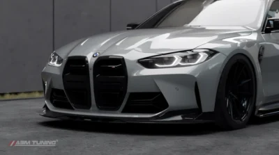 Angled front shot of grey BMW M4 G82/G83 showing full installation of ASM carbon front splitter