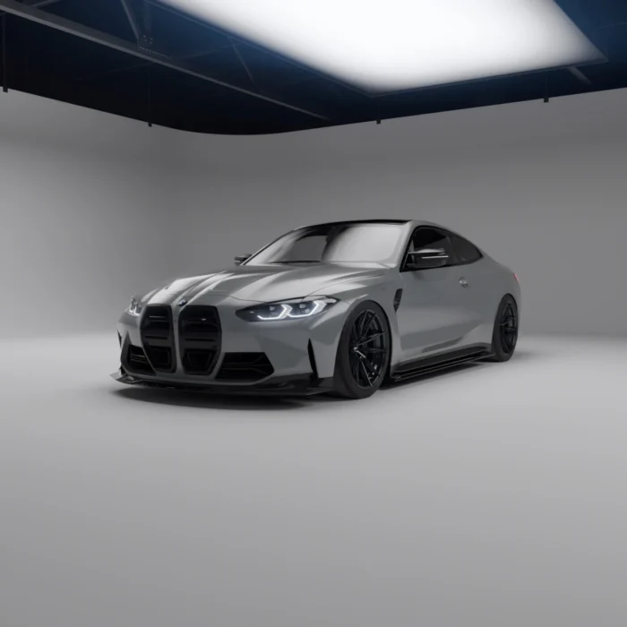 front angle of grey BMW M4 G82/G83 showcasing ASM dry carbon front splitter in studio lighting