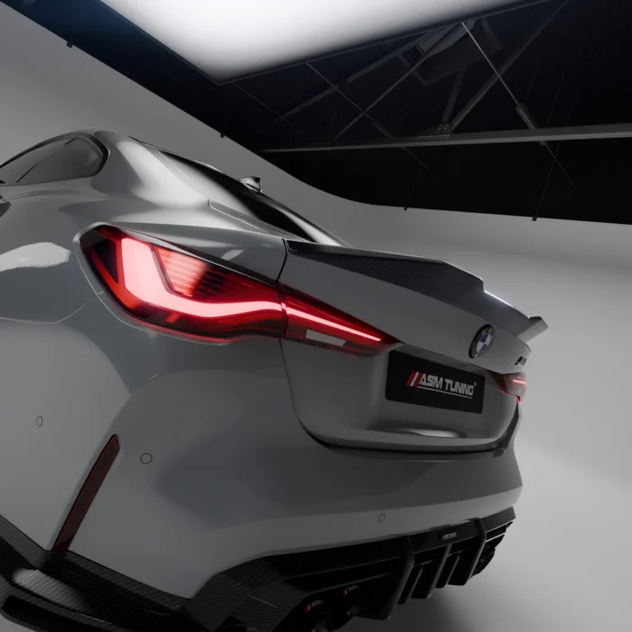 Close-up of left tail light and ASM carbon diffuser on grey BMW M4 G82