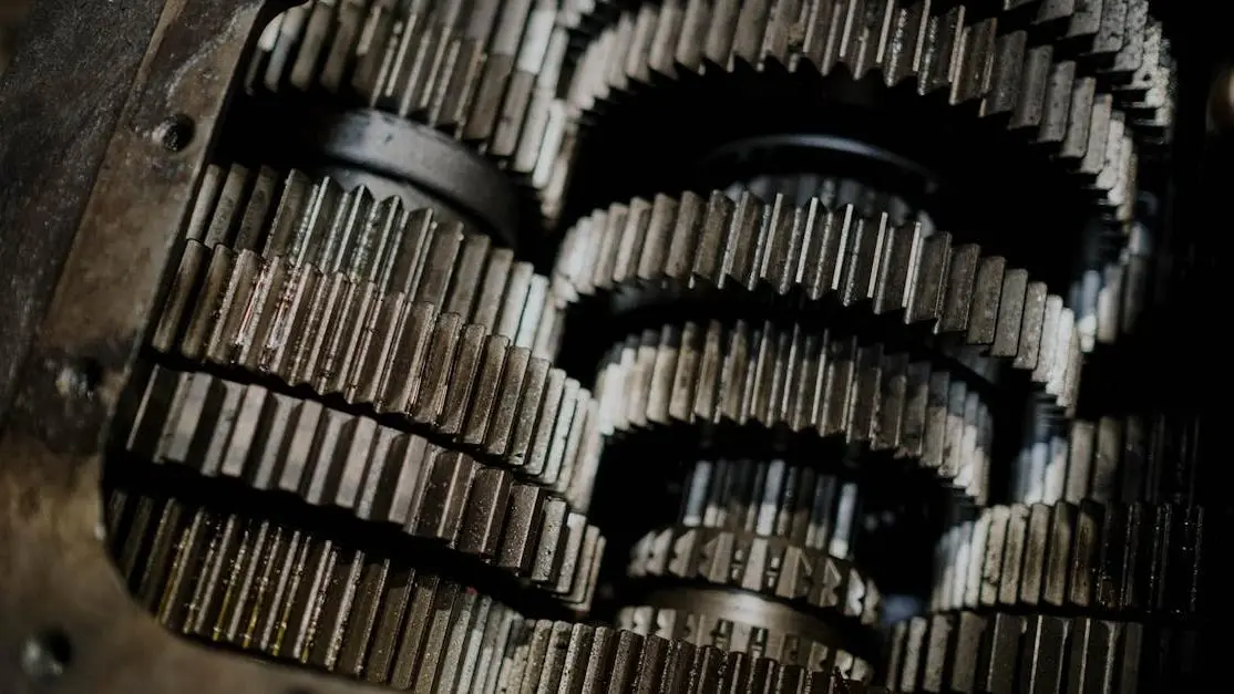 Mechanical gears illustrating clutch break in process with intricate steel parts and engineering precision.